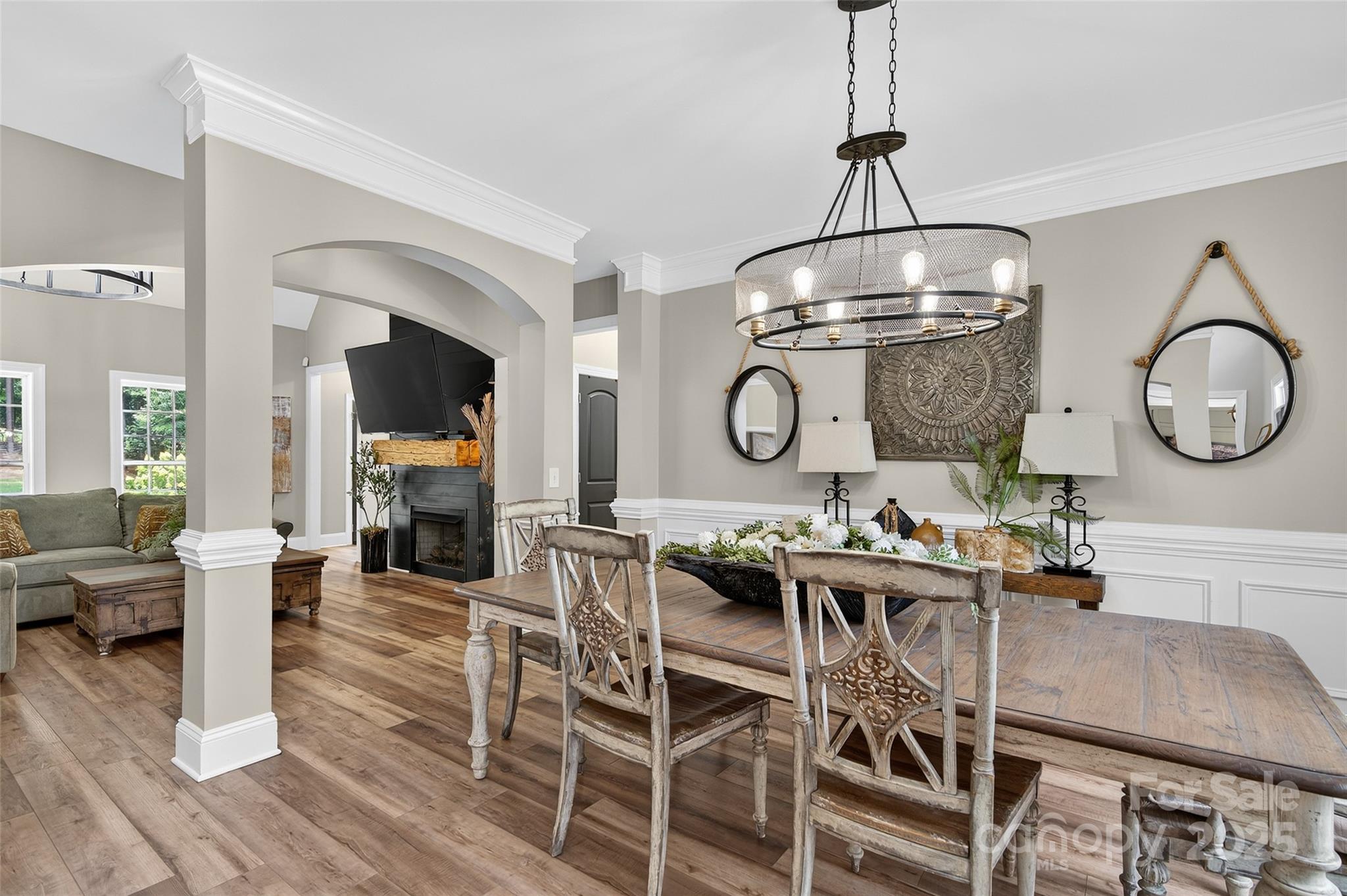 3575 Gordon Street Terrell, NC 28682 - Photo 18 of 48 a view of a dining room and hall with wooden floor
