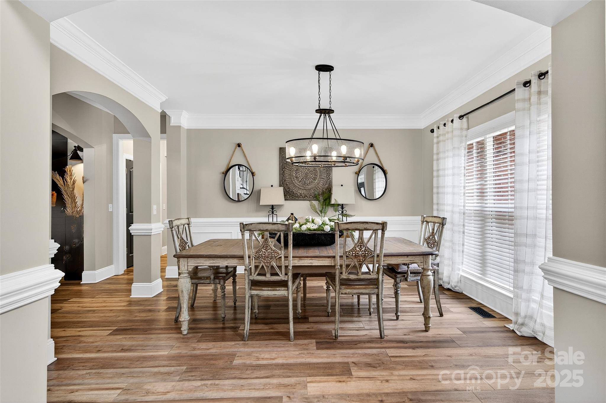 3575 Gordon Street Terrell, NC 28682 - Photo 19 of 48 a view of a dining room with furniture window and wooden floor