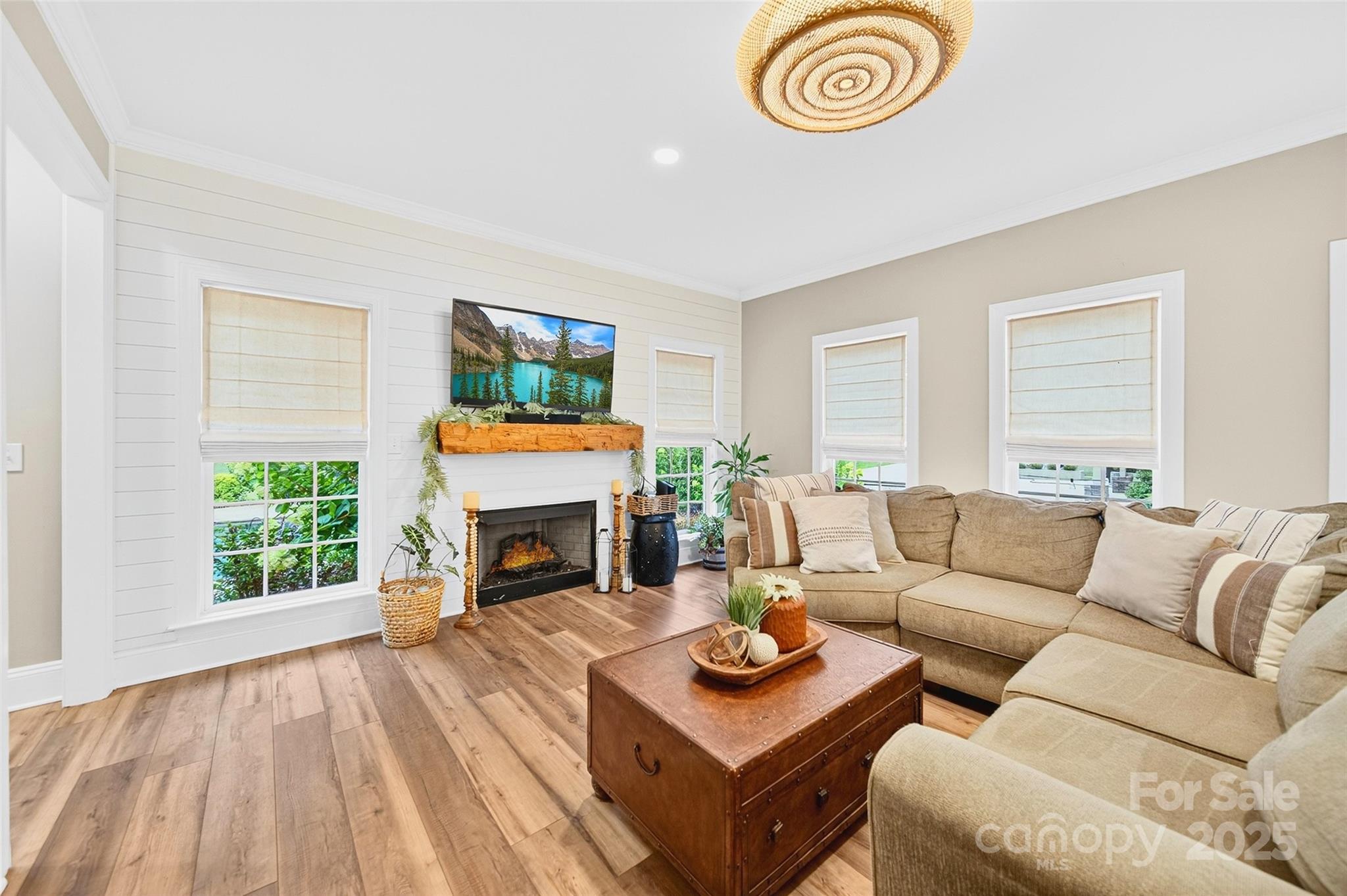 3575 Gordon Street Terrell, NC 28682 - Photo 32 of 48 a living room with furniture and a fireplace