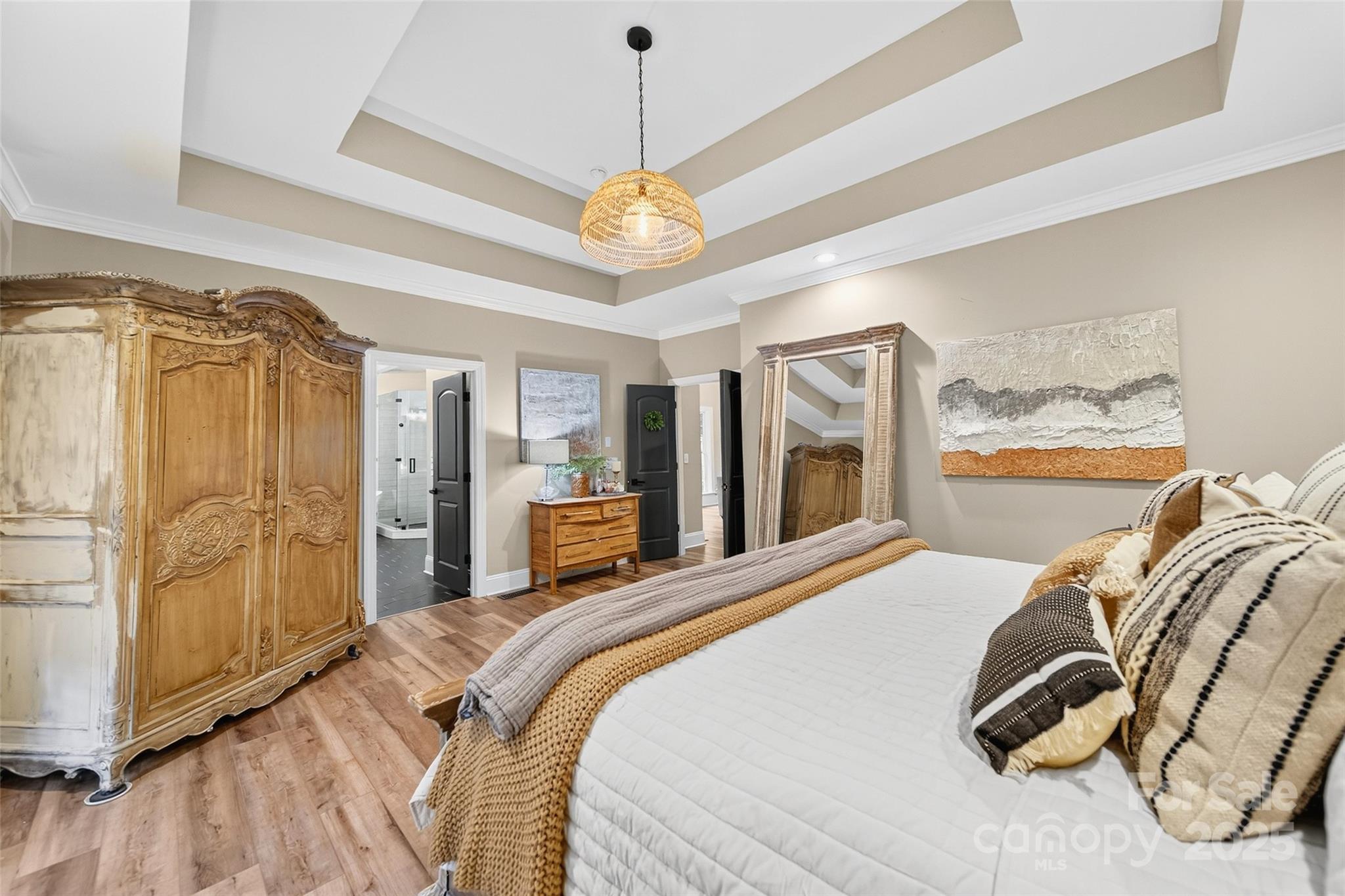 3575 Gordon Street Terrell, NC 28682 - Photo 35 of 48 a bedroom with bed and a chandelier