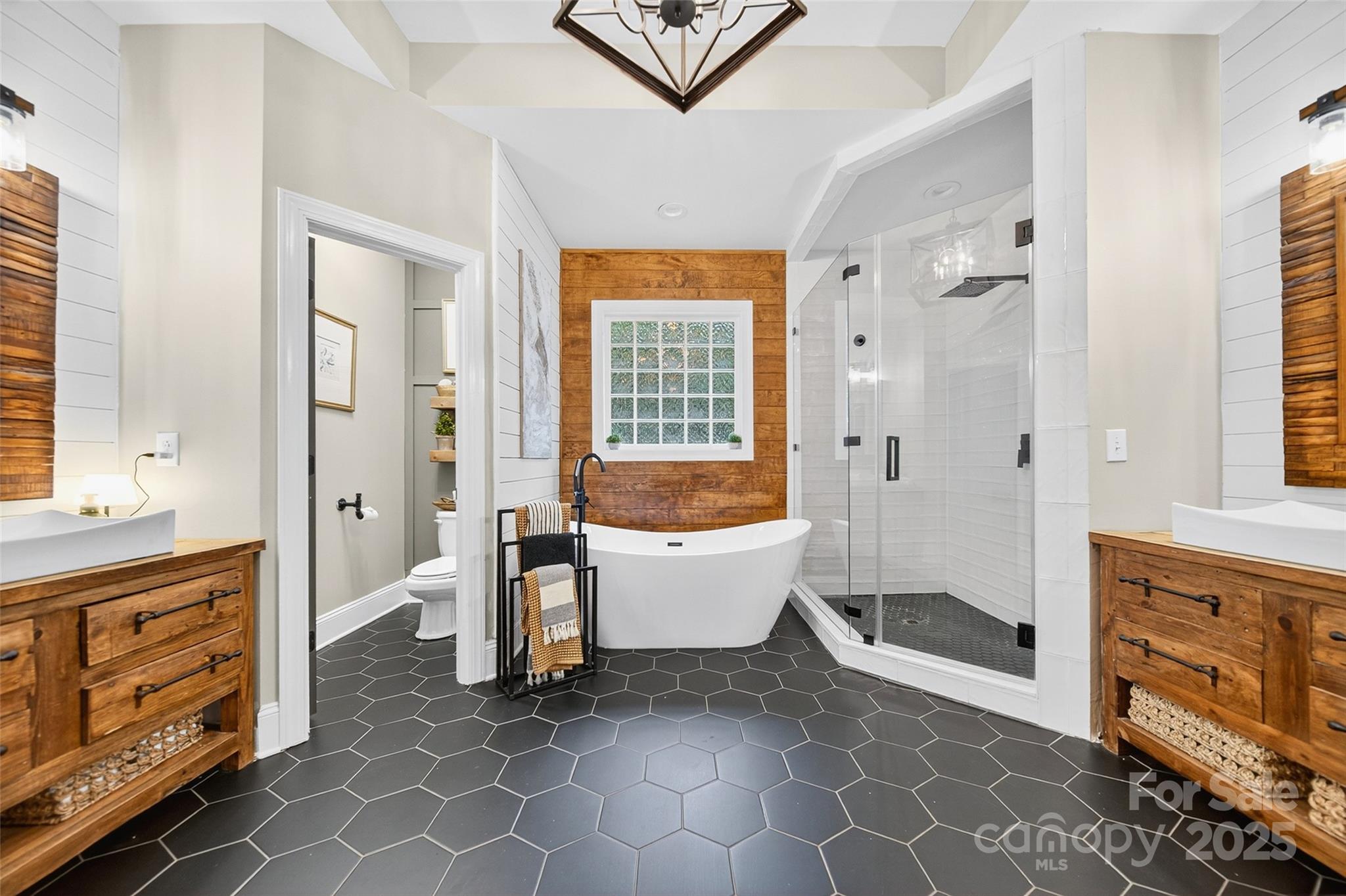 3575 Gordon Street Terrell, NC 28682 - Photo 36 of 48 a spacious bathroom with a bathtub sink and toilet