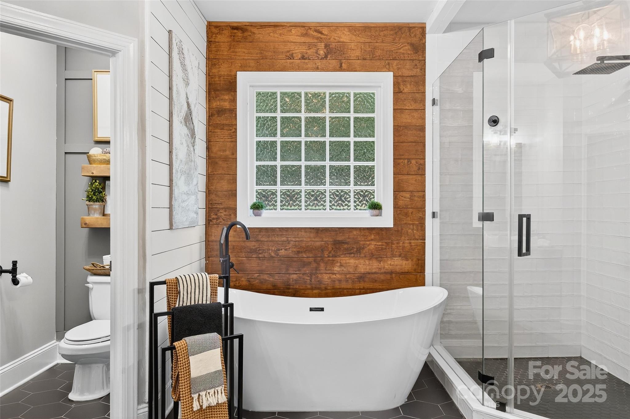 3575 Gordon Street Terrell, NC 28682 - Photo 37 of 48 a bathroom with a toilet and a shower