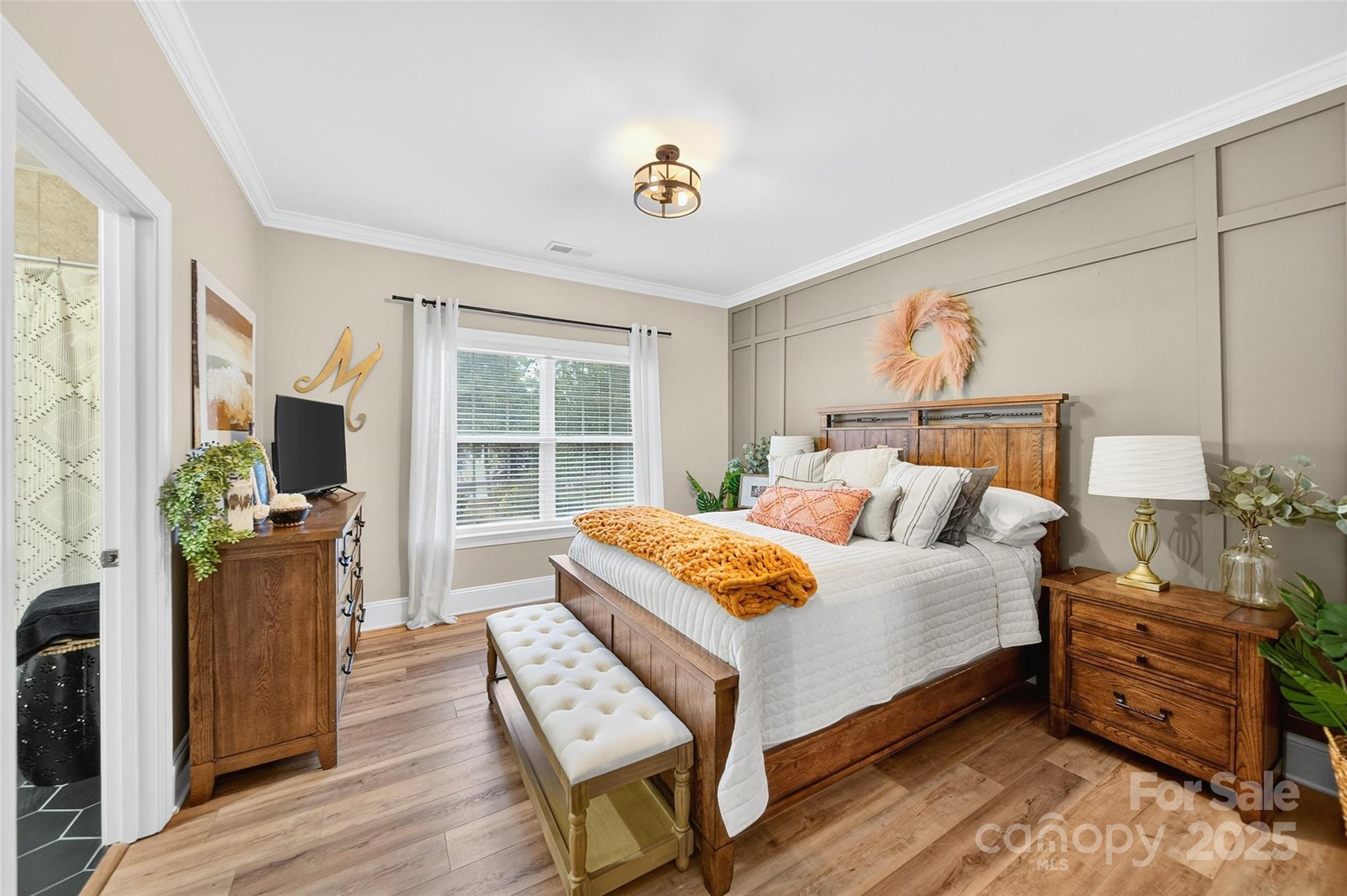 3575 Gordon Street Terrell, NC 28682 - Photo 40 of 48 a bedroom with a bed and wooden floor