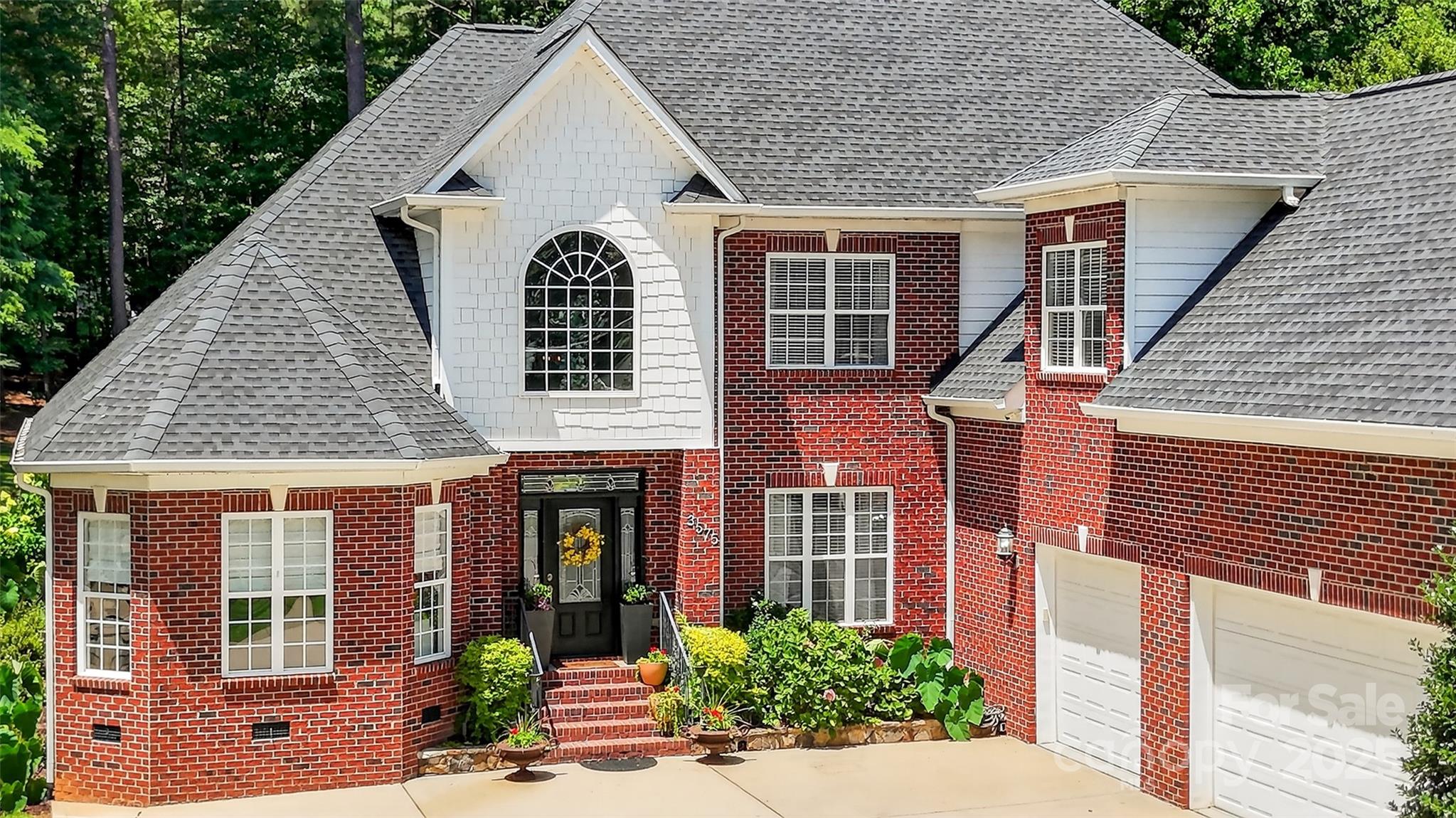 3575 Gordon Street Terrell, NC 28682 - Photo 4 of 48 a front view of a house with a yard