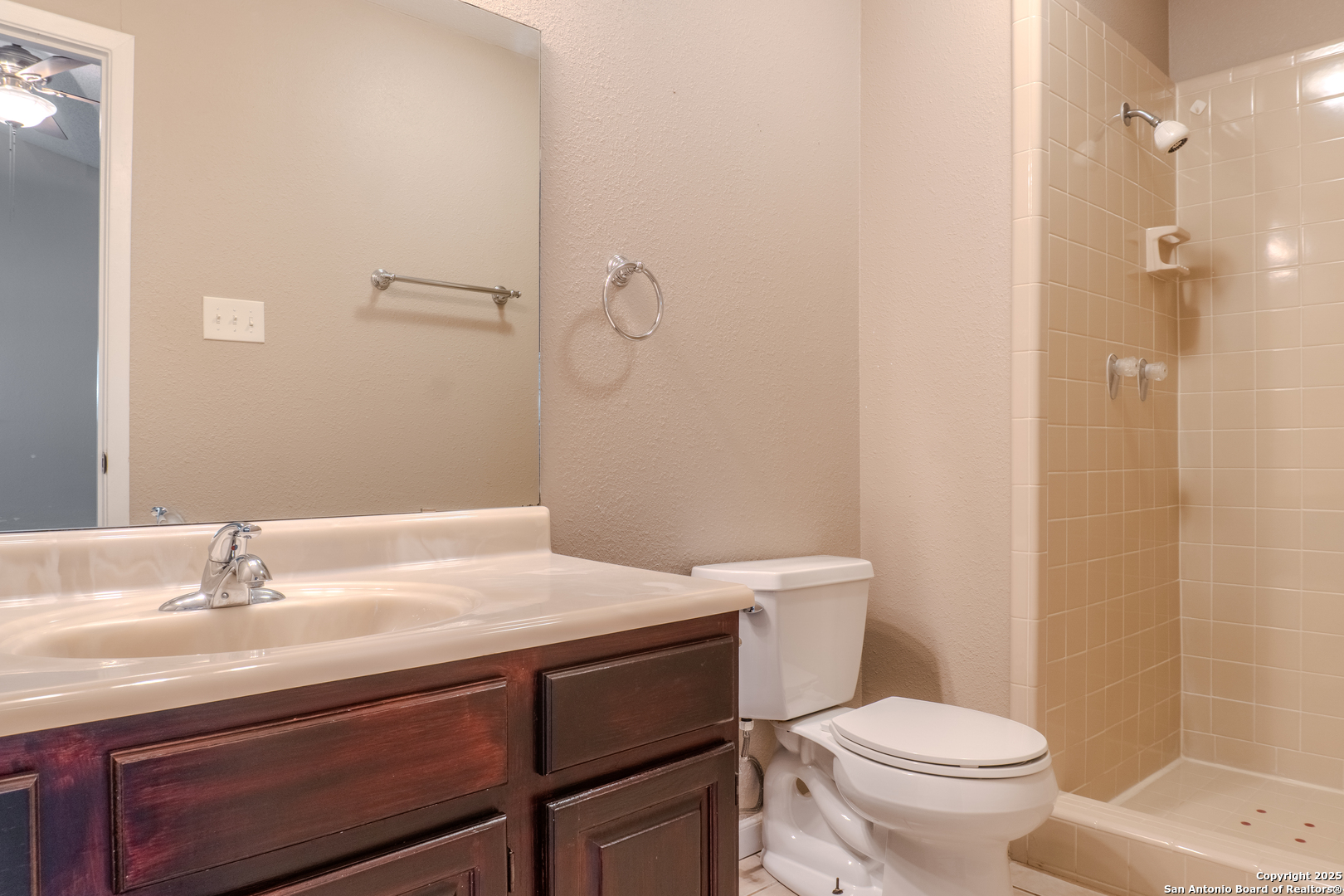 829 West Bitters Road, Unit 503 San Antonio, TX 78216 - Photo 13 of 22 a bathroom with a sink a toilet and shower