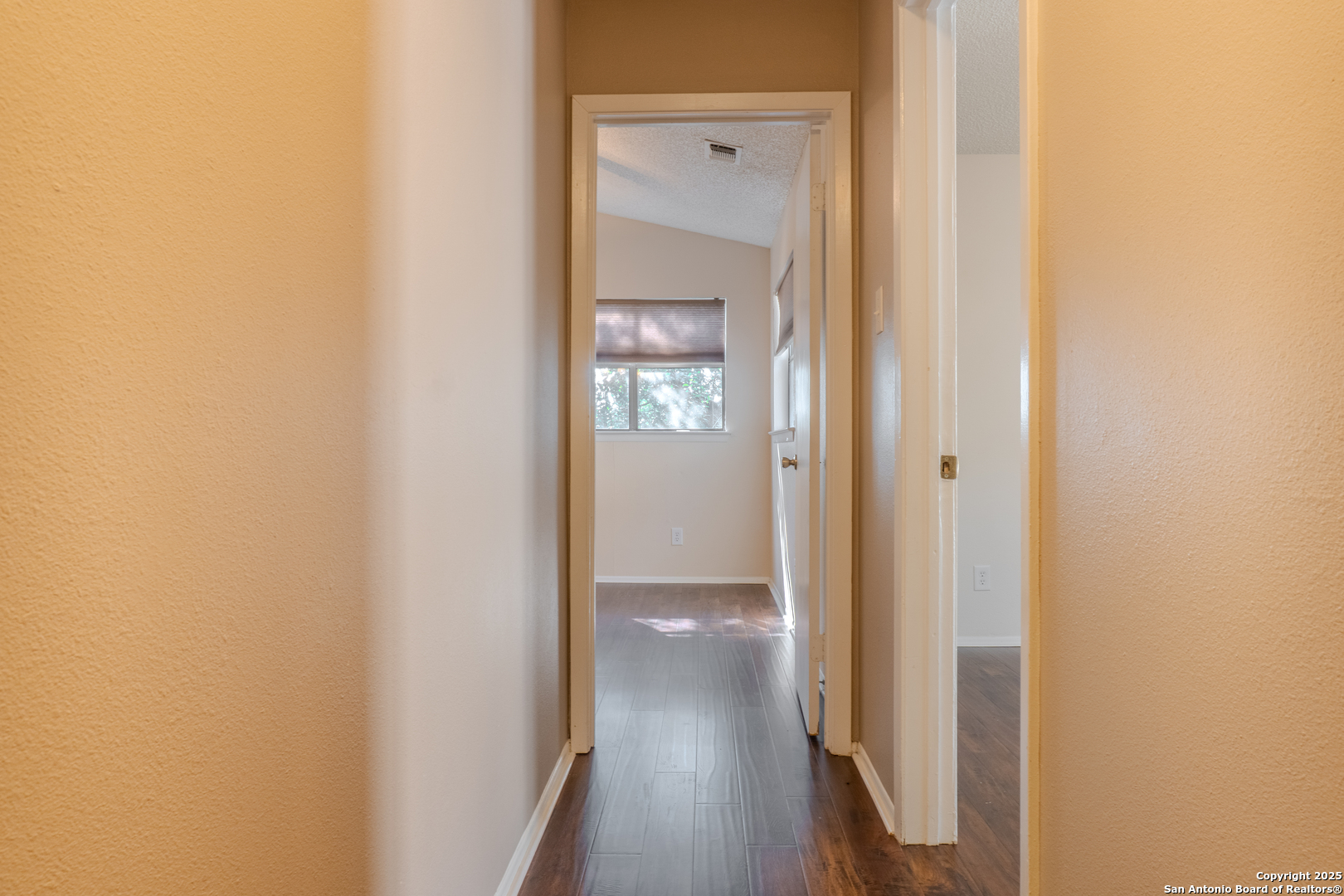 829 West Bitters Road, Unit 503 San Antonio, TX 78216 - Photo 14 of 22 a view of a hallway with wooden floor