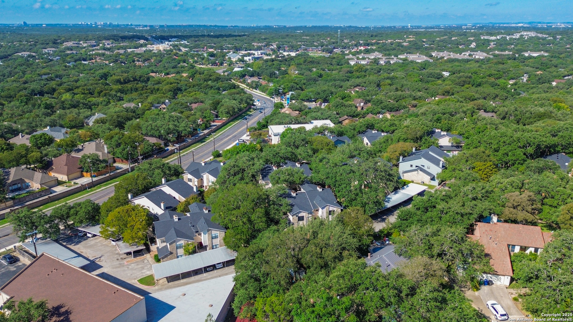829 West Bitters Road, Unit 503 San Antonio, TX 78216 - Photo 19 of 22 an aerial view of a residential houses with outdoor space and trees