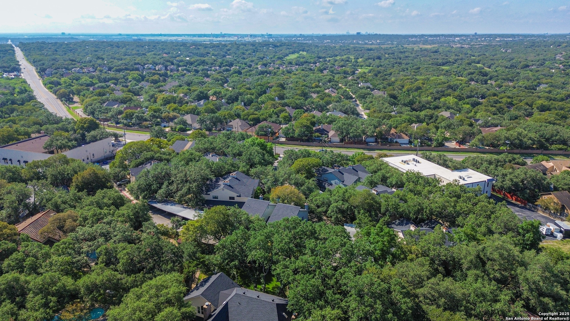 829 West Bitters Road, Unit 503 San Antonio, TX 78216 - Photo 20 of 22 an aerial view of a houses with outdoor space and trees