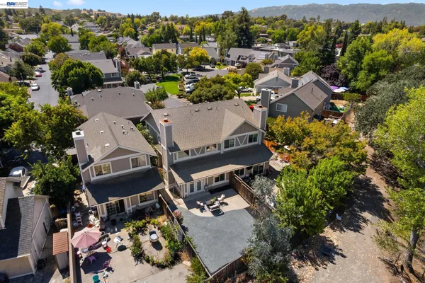 an aerial view of a house with a garden