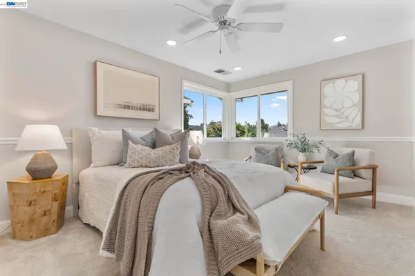 a bed room with bed and window