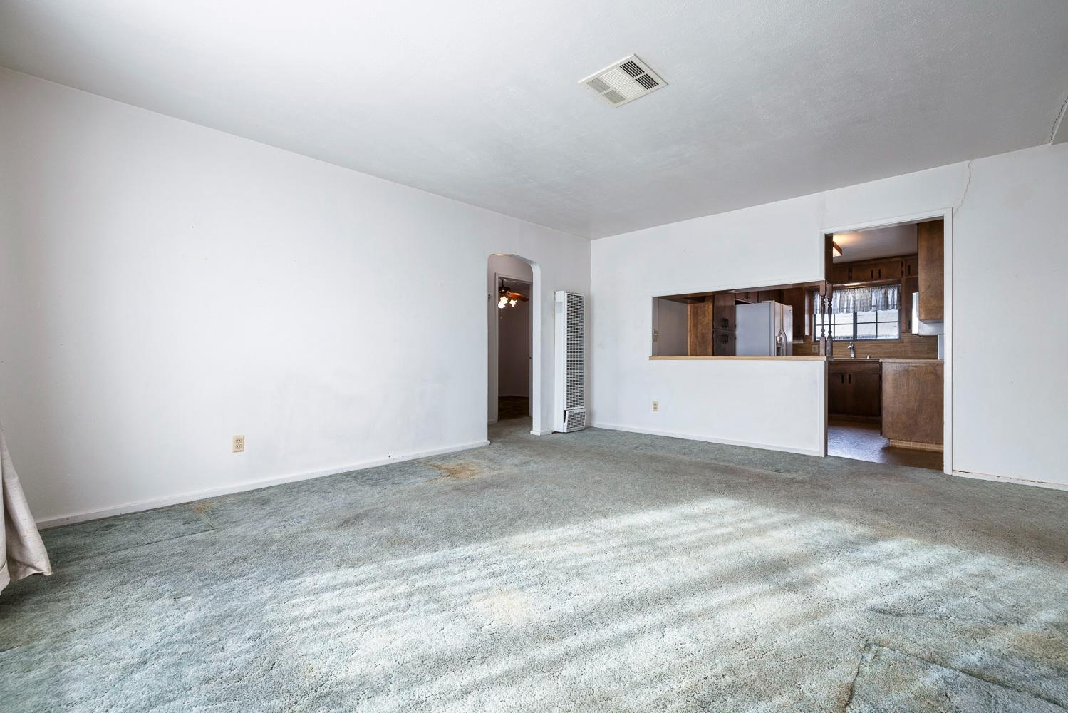 183 Harrison Street Coalinga, CA 93210 - Photo 12 of 45 a view of empty room with kitchen