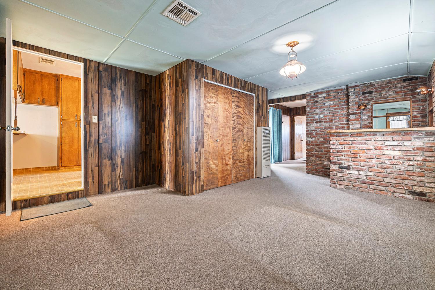 183 Harrison Street Coalinga, CA 93210 - Photo 19 of 45 a view of an empty room with a window