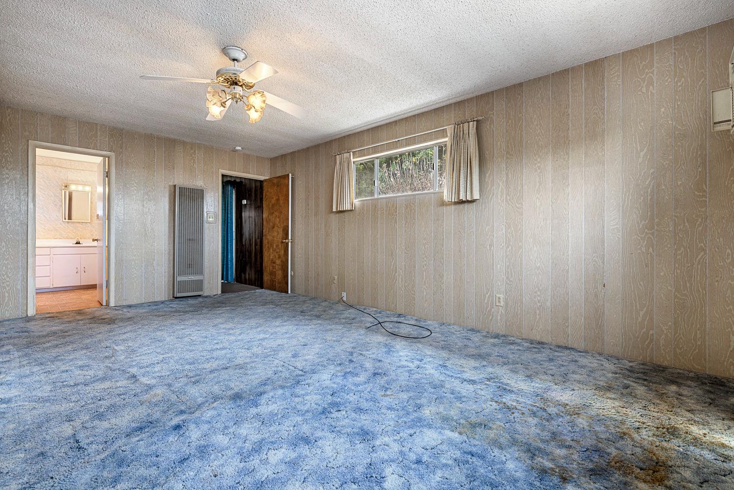 183 Harrison Street Coalinga, CA 93210 - Photo 25 of 45 a view of an empty room and chandelier fan