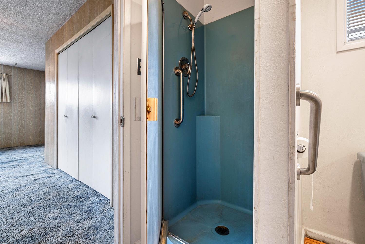 183 Harrison Street Coalinga, CA 93210 - Photo 29 of 45 a view of a bathroom from a hallway