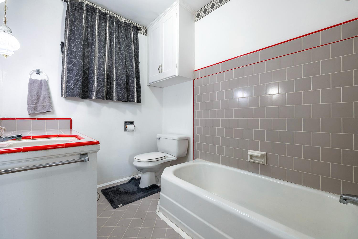 183 Harrison Street Coalinga, CA 93210 - Photo 32 of 45 a bathroom with a sink and a toilet