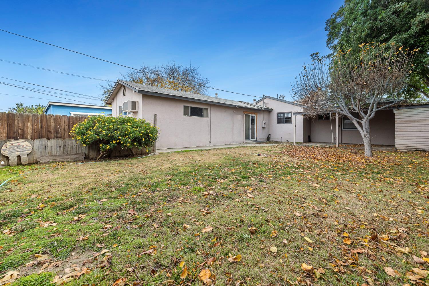 183 Harrison Street Coalinga, CA 93210 - Photo 41 of 45 front view of a house with a yard