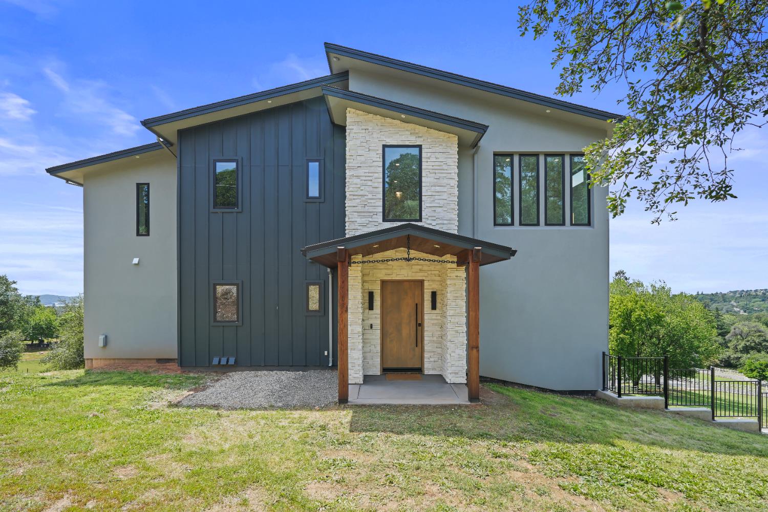 2661 Shirland Tract Road Auburn, CA 95603 - Photo 1 of 87 a front view of a house with a yard