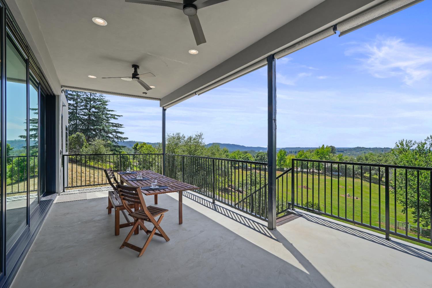 2661 Shirland Tract Road Auburn, CA 95603 - Photo 34 of 87 a view of a chairs and table in the balcony
