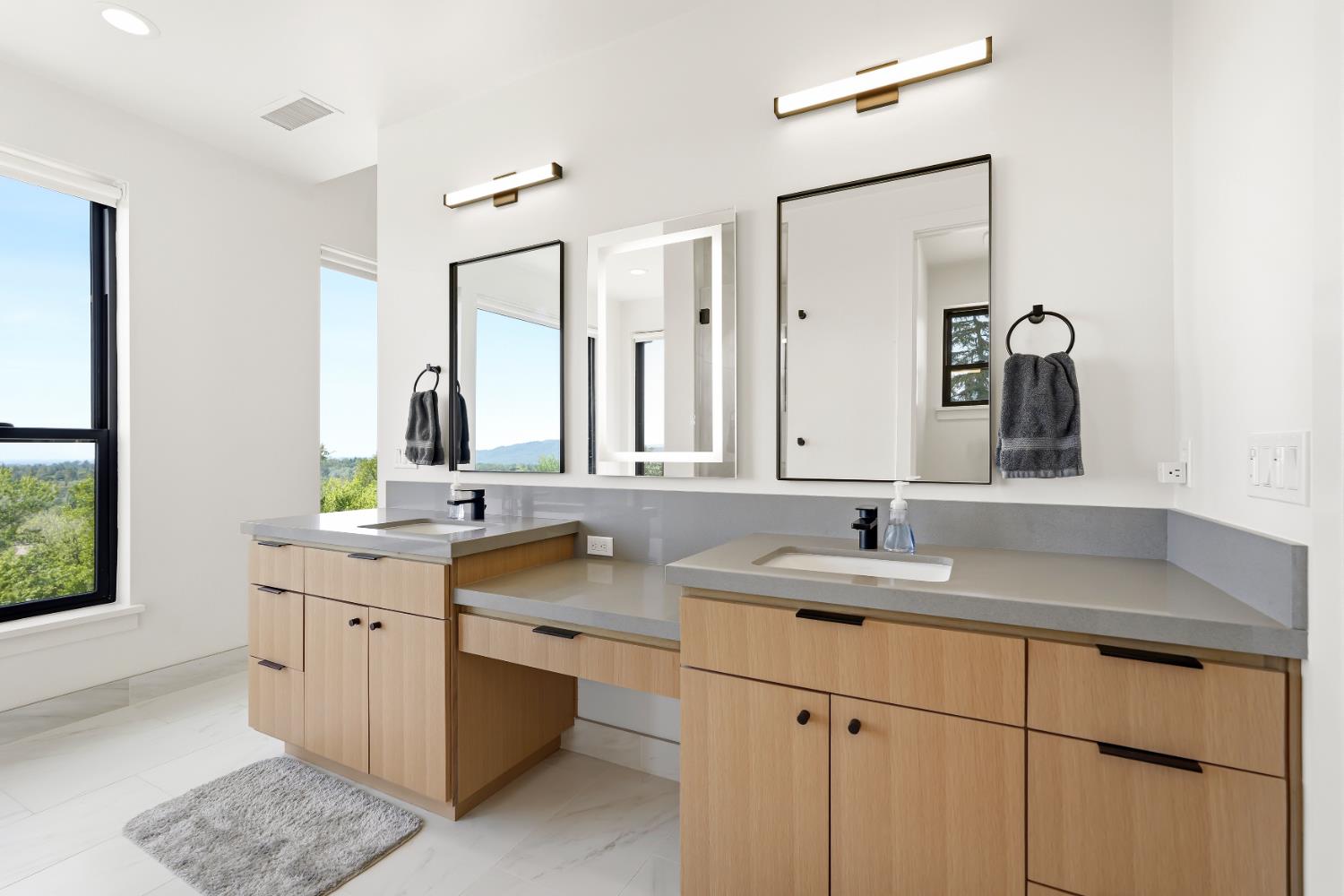 2661 Shirland Tract Road Auburn, CA 95603 - Photo 41 of 87 a bathroom with a double vanity sink mirror and double