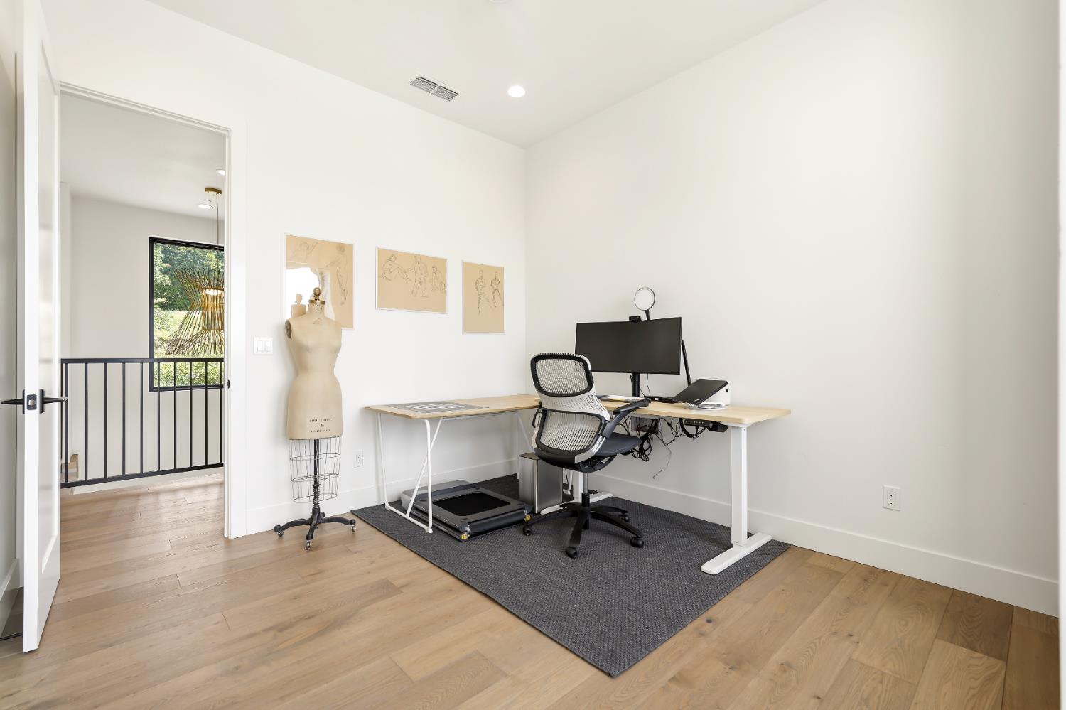 2661 Shirland Tract Road Auburn, CA 95603 - Photo 52 of 87 a view of a workspace with furniture and a window