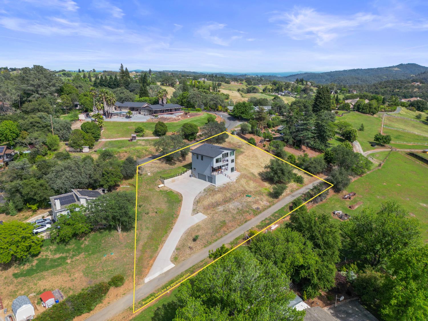 2661 Shirland Tract Road Auburn, CA 95603 - Photo 80 of 87 a view of a city with mountains in the background
