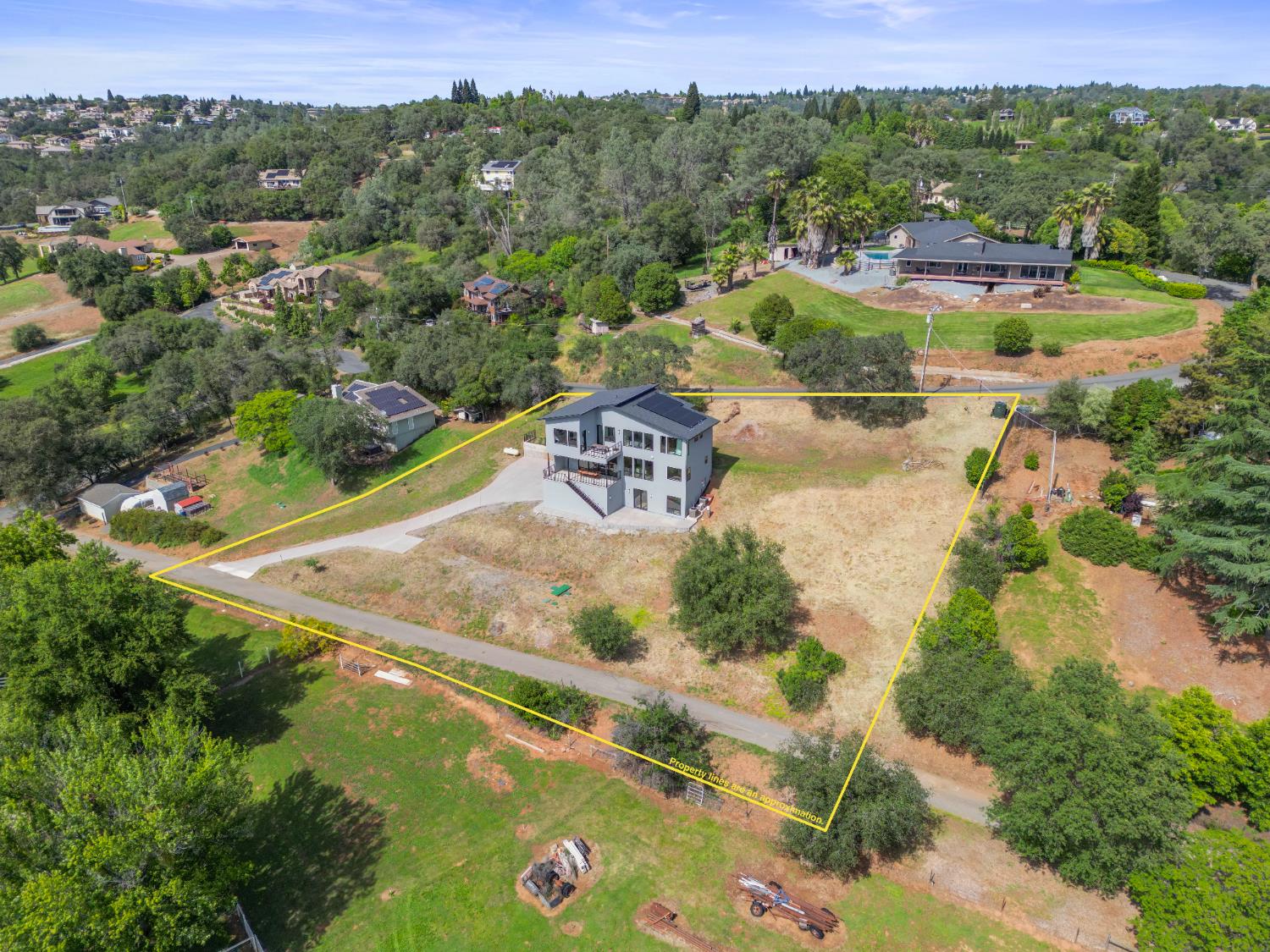 2661 Shirland Tract Road Auburn, CA 95603 - Photo 81 of 87 an aerial view of residential houses with outdoor space and river