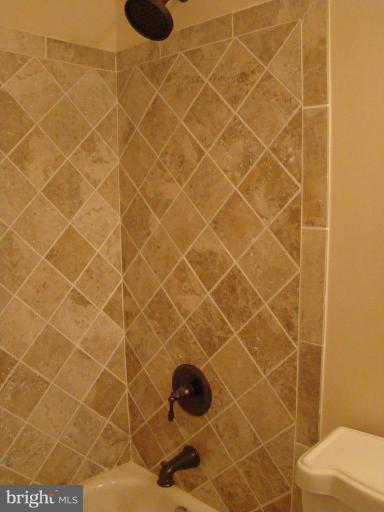 13822 Gilbert Road Woodbridge, VA 22193 - Photo 12 of 28 HALL BATH ITALIAN TILE