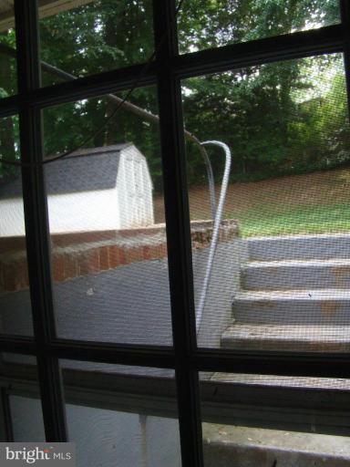 13822 Gilbert Road Woodbridge, VA 22193 - Photo 13 of 28 SHED OUTSIDE WALKOUT