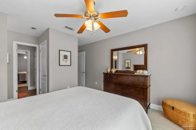 a bathroom with a sink vanity and a mirror