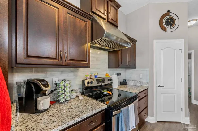 a bathroom with a bathtub and a window