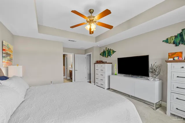 a living room with patio furniture and a window