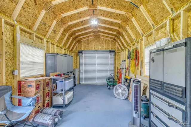 a view of a backyard with a garden