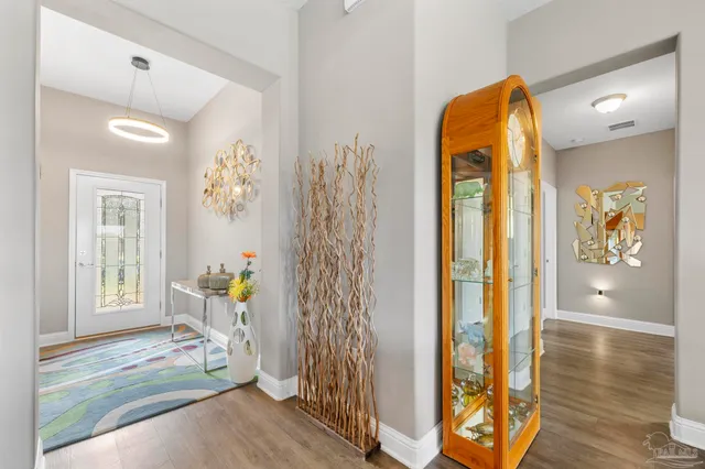 a bedroom with furniture and a gym equipment