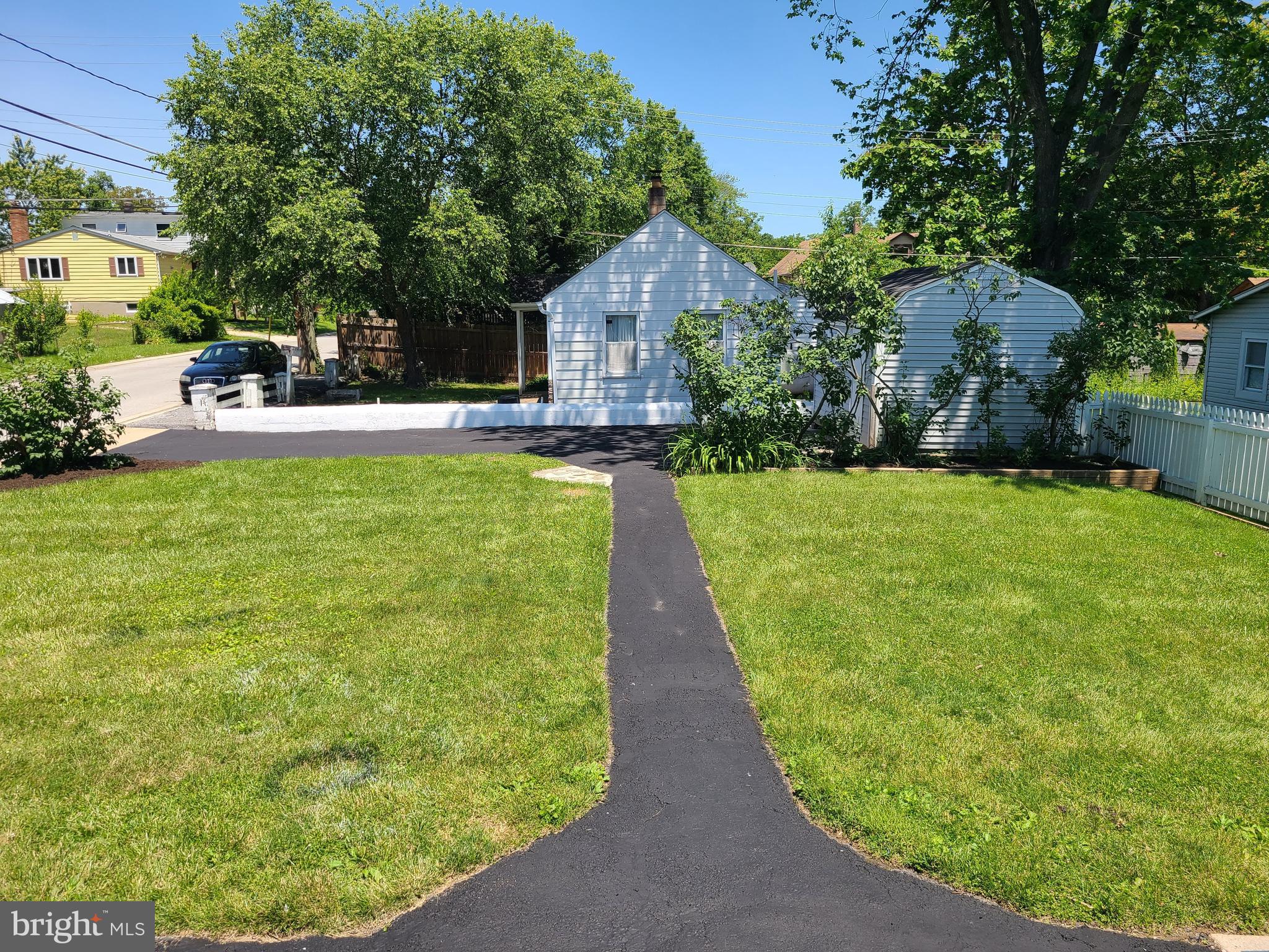 1700 Goodview Road Parkville, MD 21234 - Photo 11 of 50 a front view of a house with garden