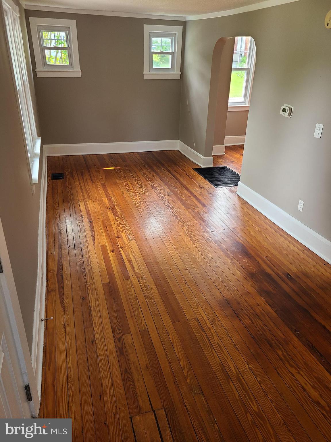 1700 Goodview Road Parkville, MD 21234 - Photo 18 of 50 wooden floor in an empty room with a window