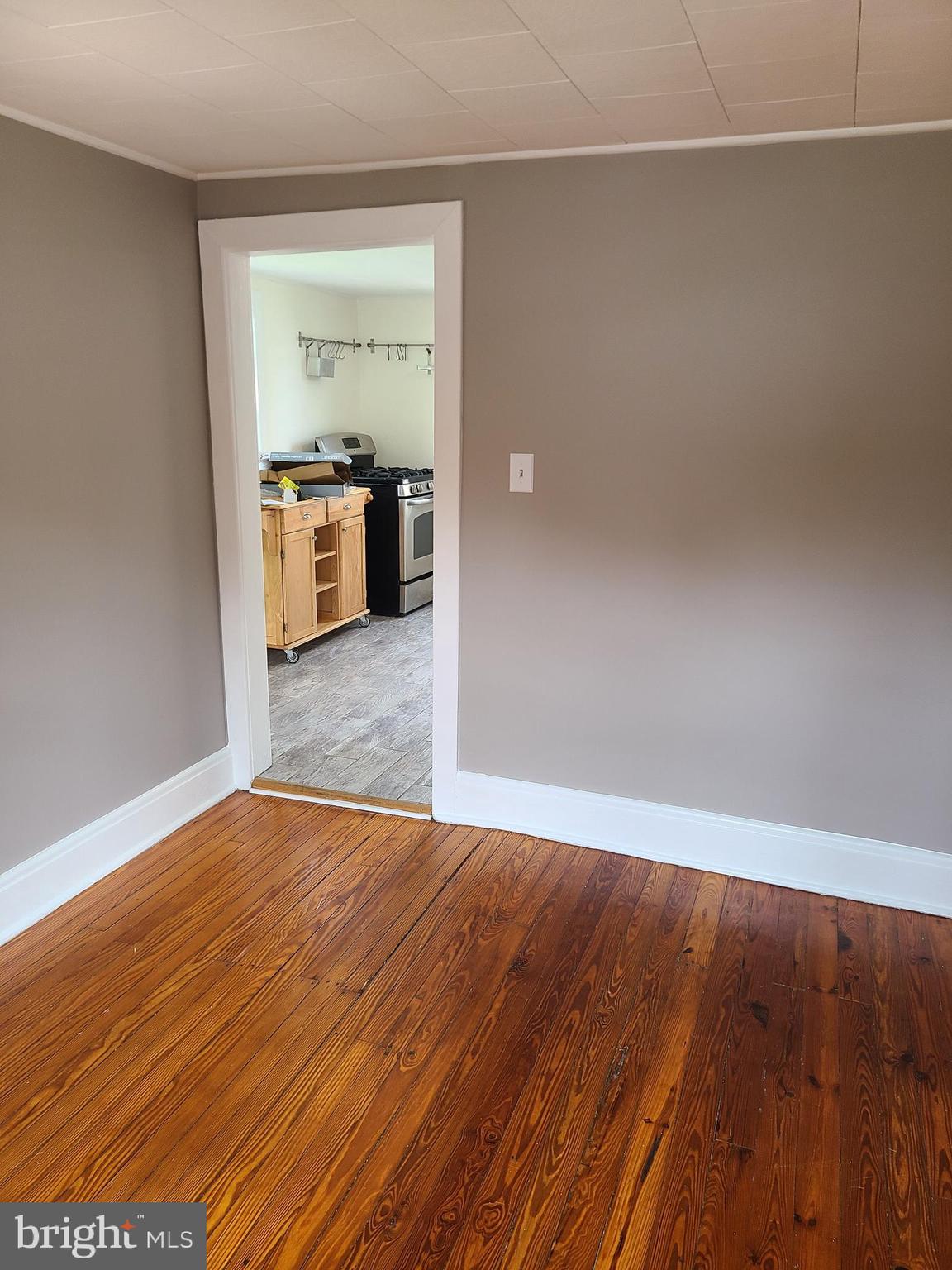 1700 Goodview Road Parkville, MD 21234 - Photo 23 of 50 a view of a kitchen with wooden floor and a sink