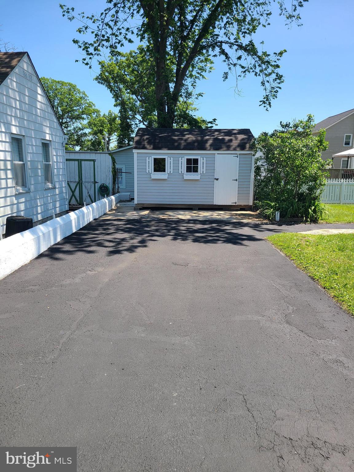 1700 Goodview Road Parkville, MD 21234 - Photo 40 of 50 a view of a house with a yard and garage