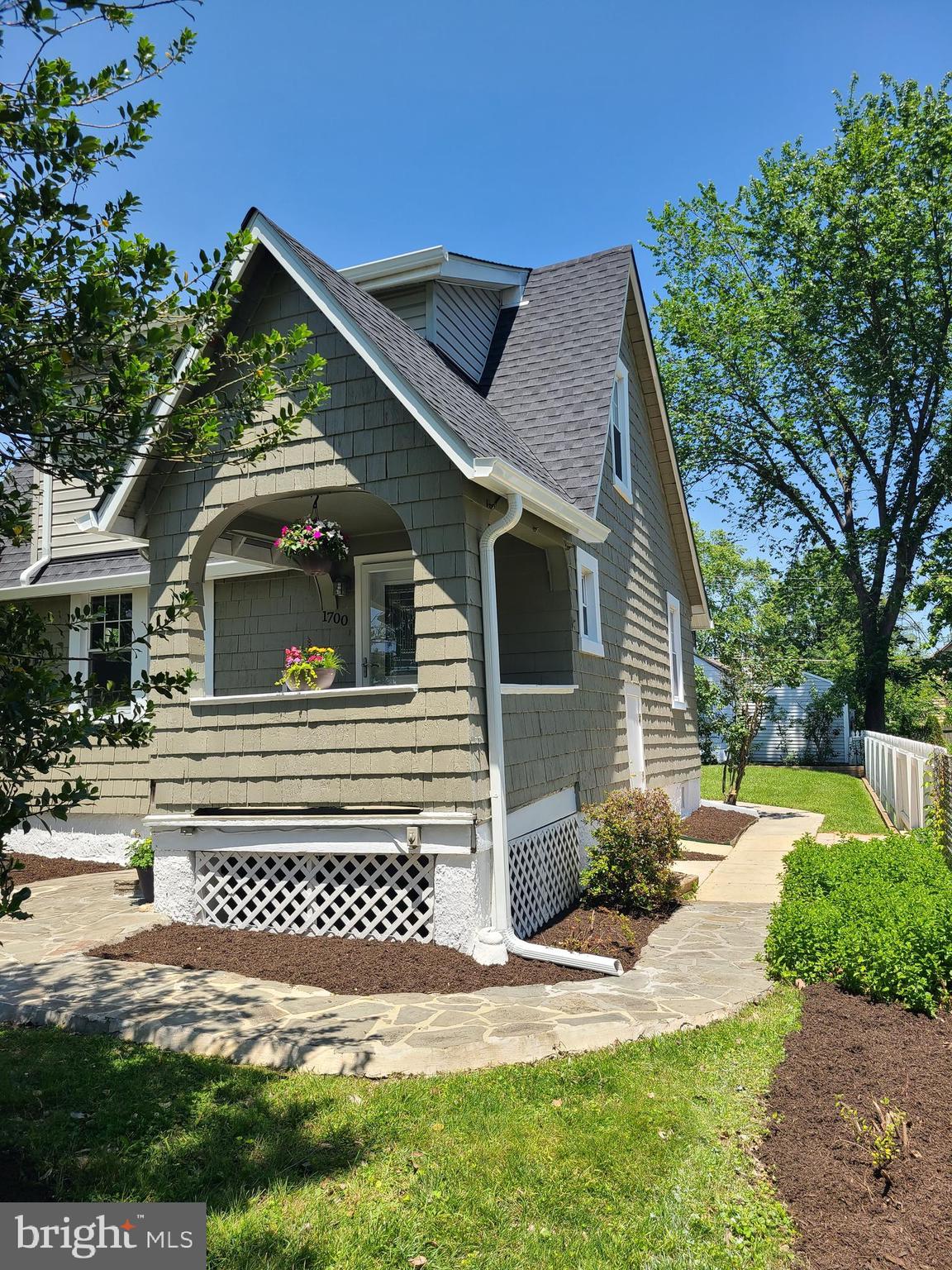 1700 Goodview Road Parkville, MD 21234 - Photo 6 of 50 a front view of a house with a yard