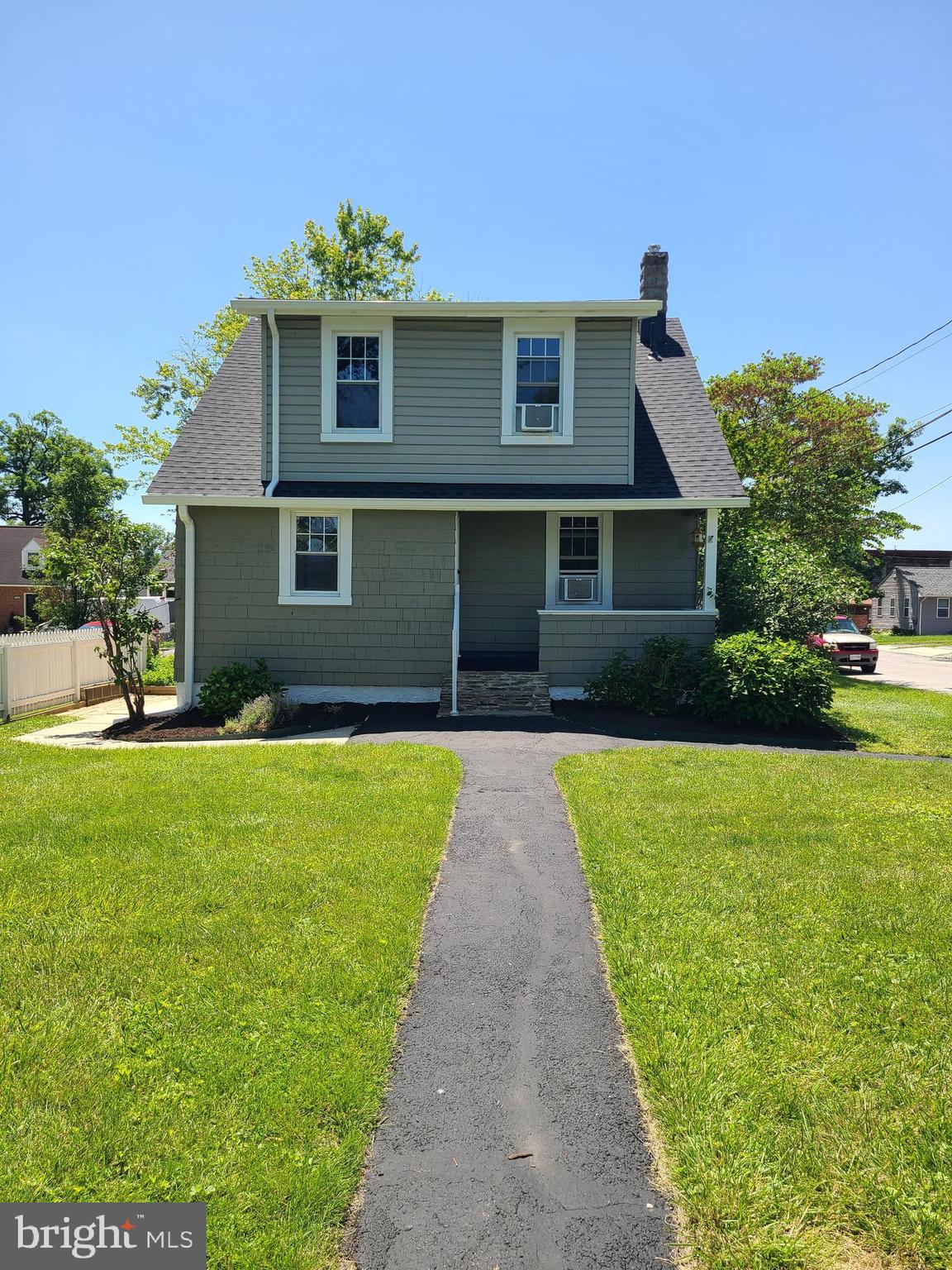 1700 Goodview Road Parkville, MD 21234 - Photo 9 of 50 a front view of a house with a yard