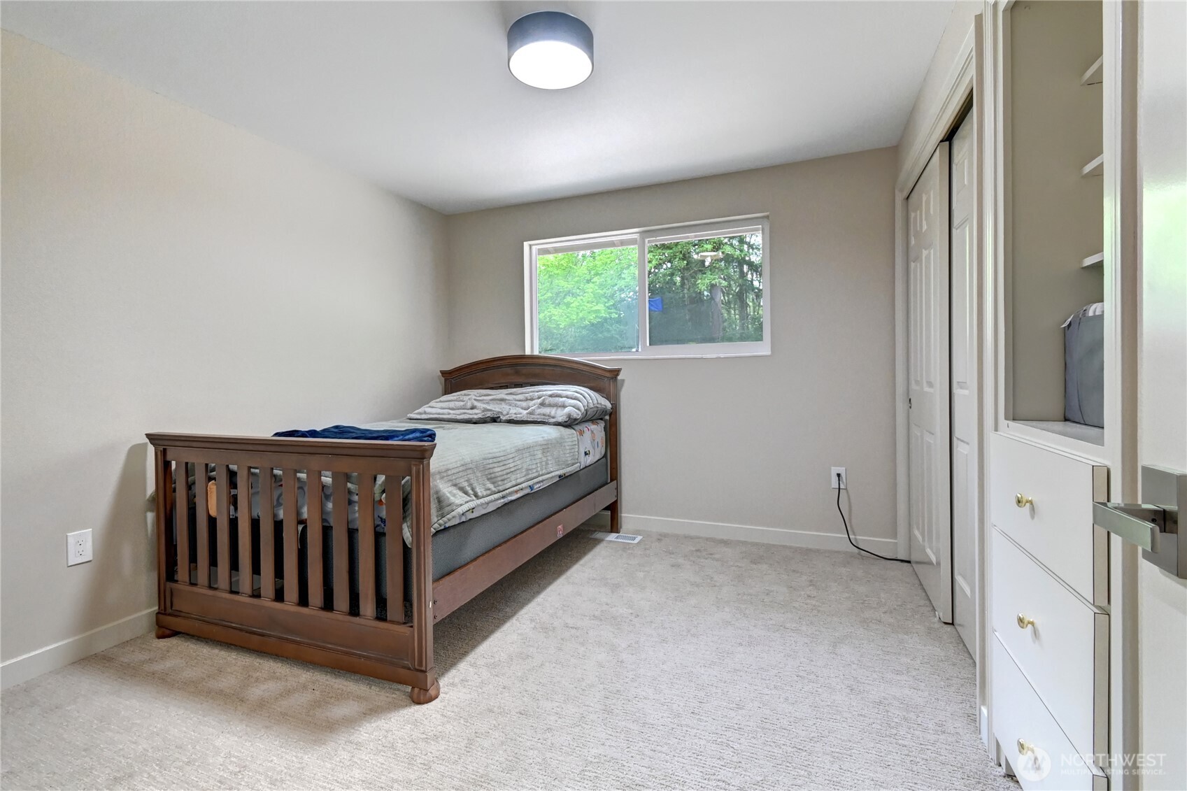28539 Northeast Tolt Hill Road Carnation, WA 98014 - Photo 23 of 36 a bedroom with a bed and window