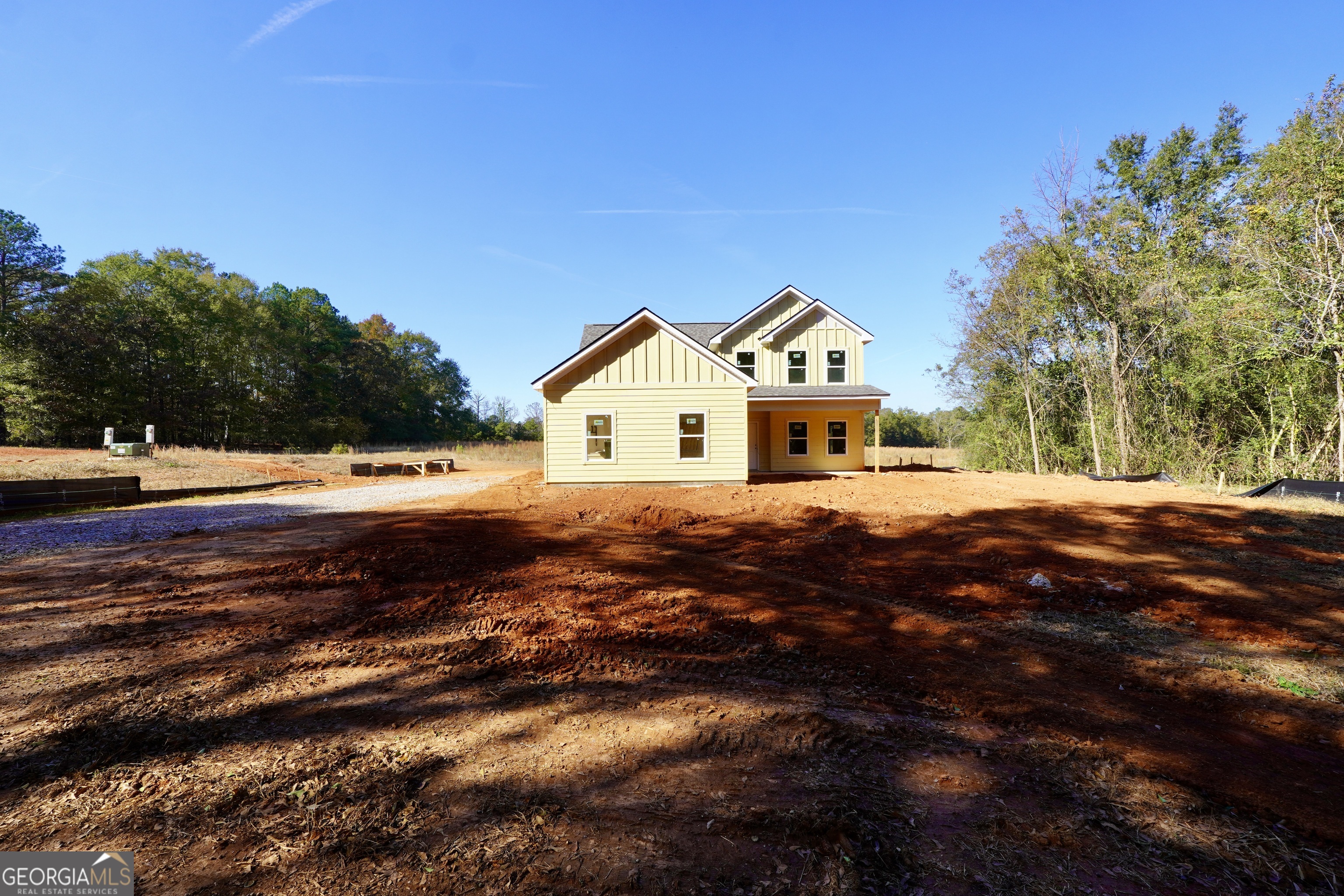 59 Oak Road Locust Grove, GA 30248 - Photo 2 of 13 a view of house with a yard