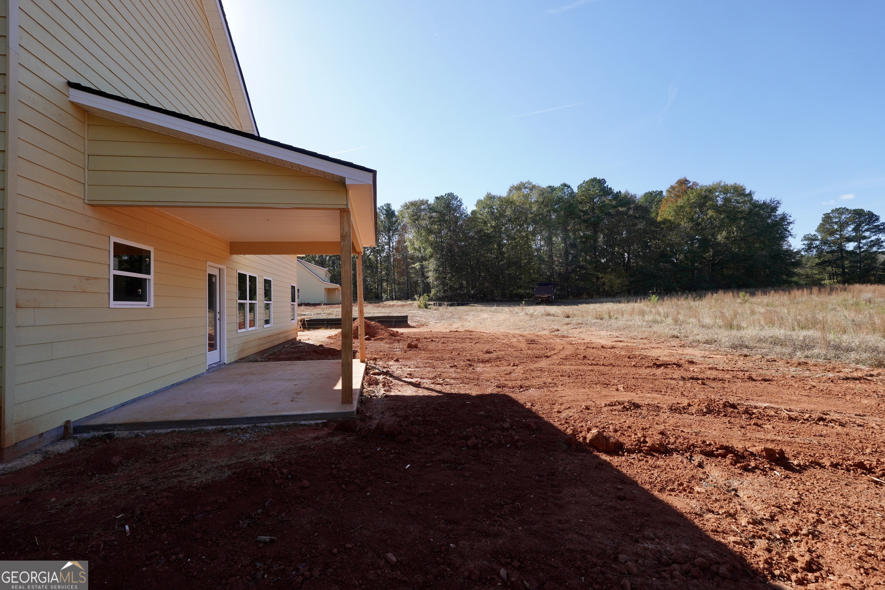 59 Oak Road Locust Grove, GA 30248 - Photo 7 of 13 a view of swimming pool with an outdoor seating