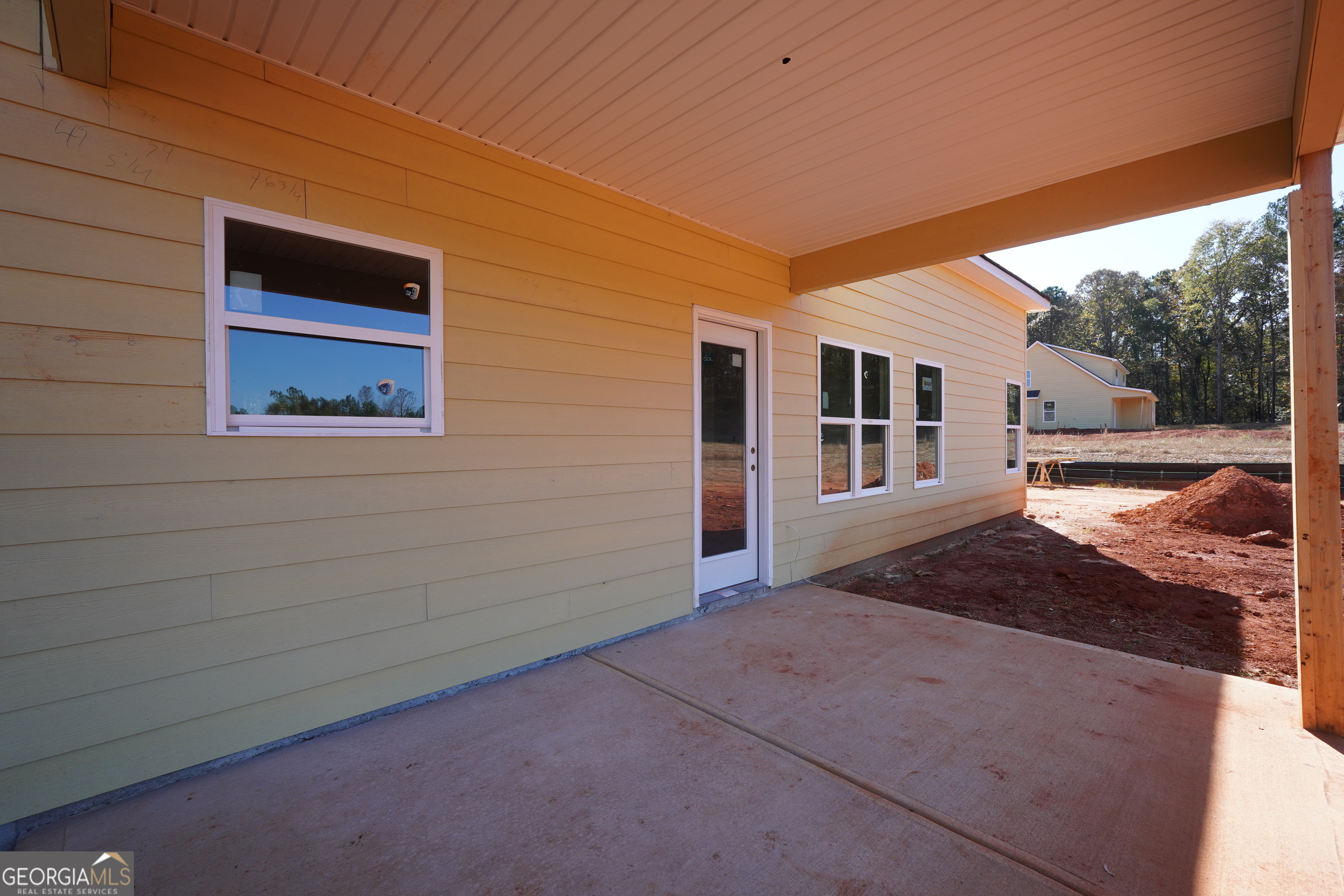 59 Oak Road Locust Grove, GA 30248 - Photo 9 of 13 a view of a house with backyard