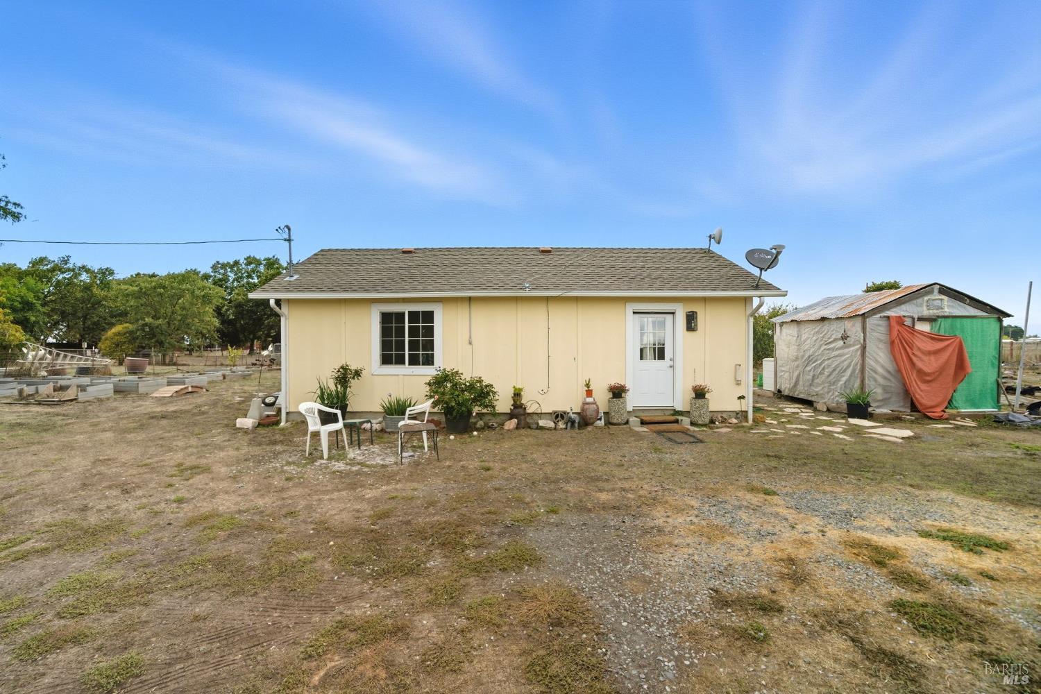 3960 Llano Road Santa Rosa, CA 95407 - Photo 27 of 52 a view of a house with backyard and sitting area