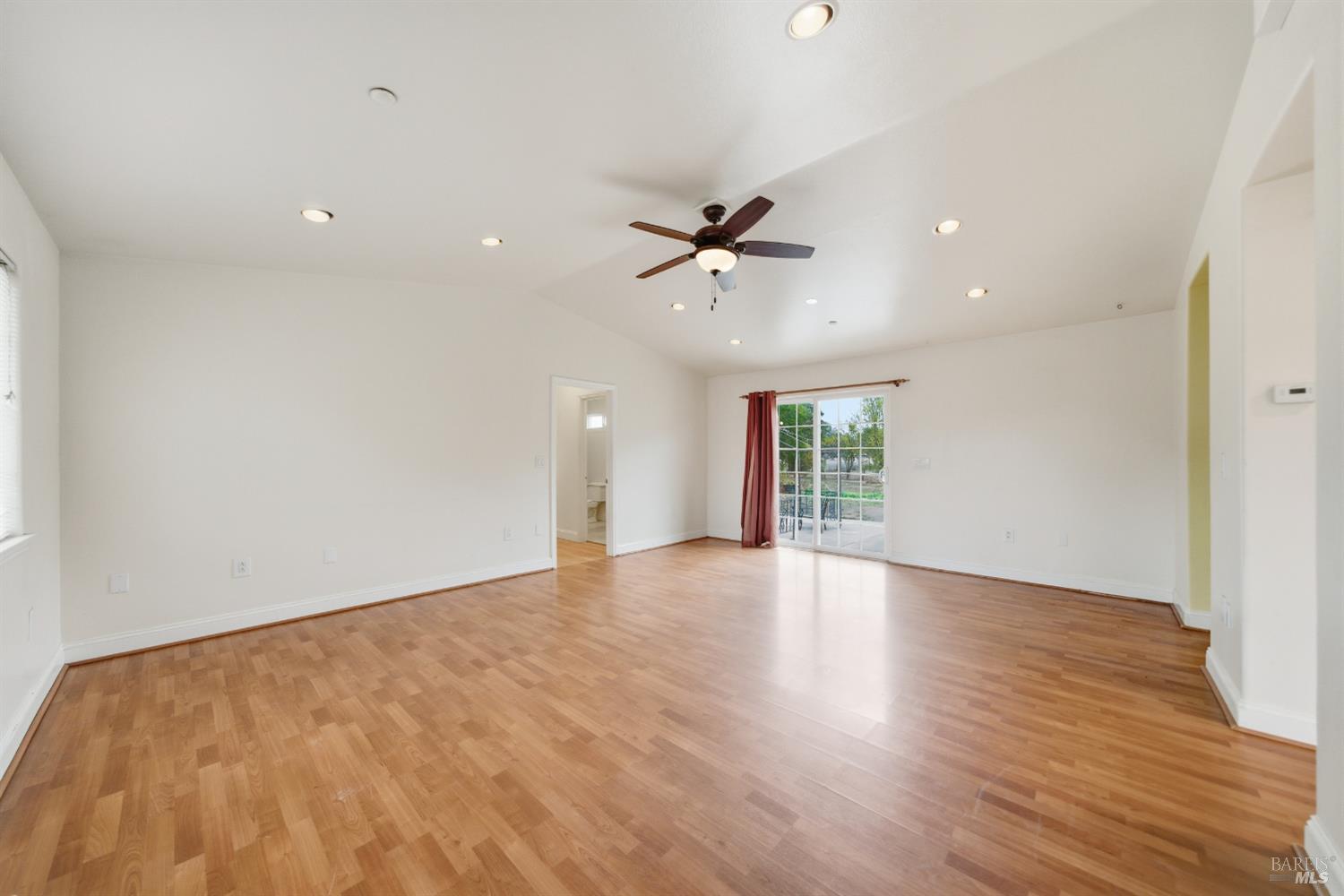 3960 Llano Road Santa Rosa, CA 95407 - Photo 3 of 52 wooden floor in an empty room with a window