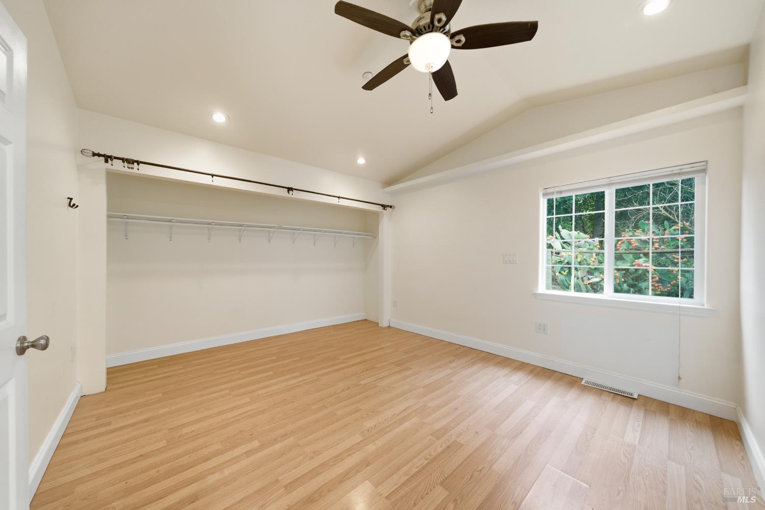 3960 Llano Road Santa Rosa, CA 95407 - Photo 5 of 52 wooden floor in an empty room with a window