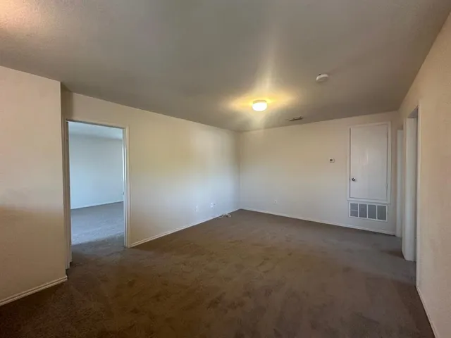 an empty room with an entryway
