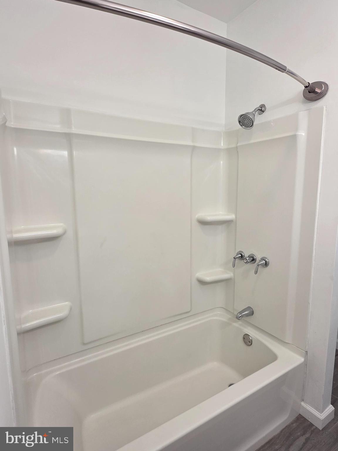 2715 East Ontario Street, Unit C Philadelphia, PA 19134 - Photo 15 of 32 a bathroom with a bathtub