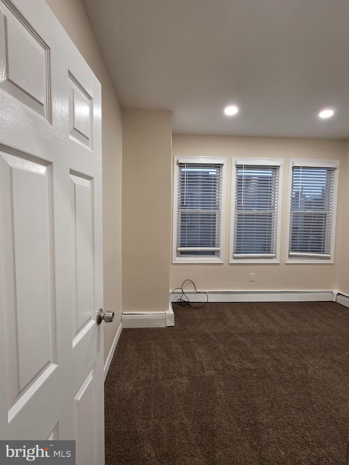 2715 East Ontario Street, Unit C Philadelphia, PA 19134 - Photo 21 of 32 a view of an empty room with a window