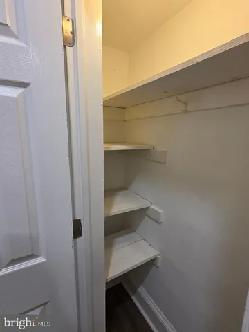 a view of a room with rack on the wall